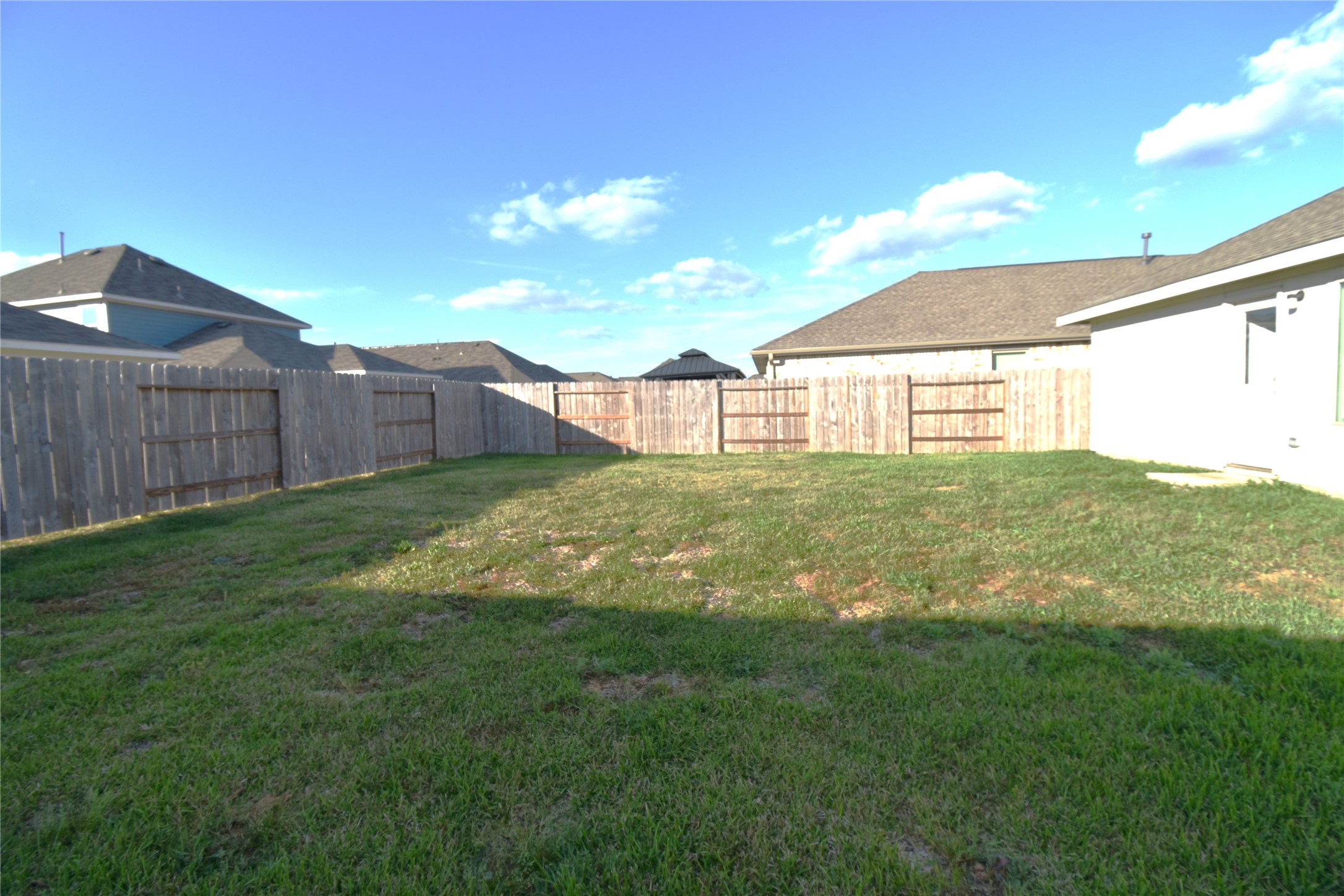 3326 Spanish Oak Lane Rosenberg, TX 77471 - Photo 23 of 24 a view of a back yard of the house