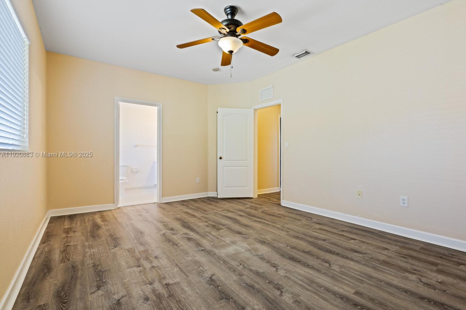 8521 Southwest 214th Terrace Cutler Bay, FL 33189 - Photo 15 of 21 wooden floor in an empty room
