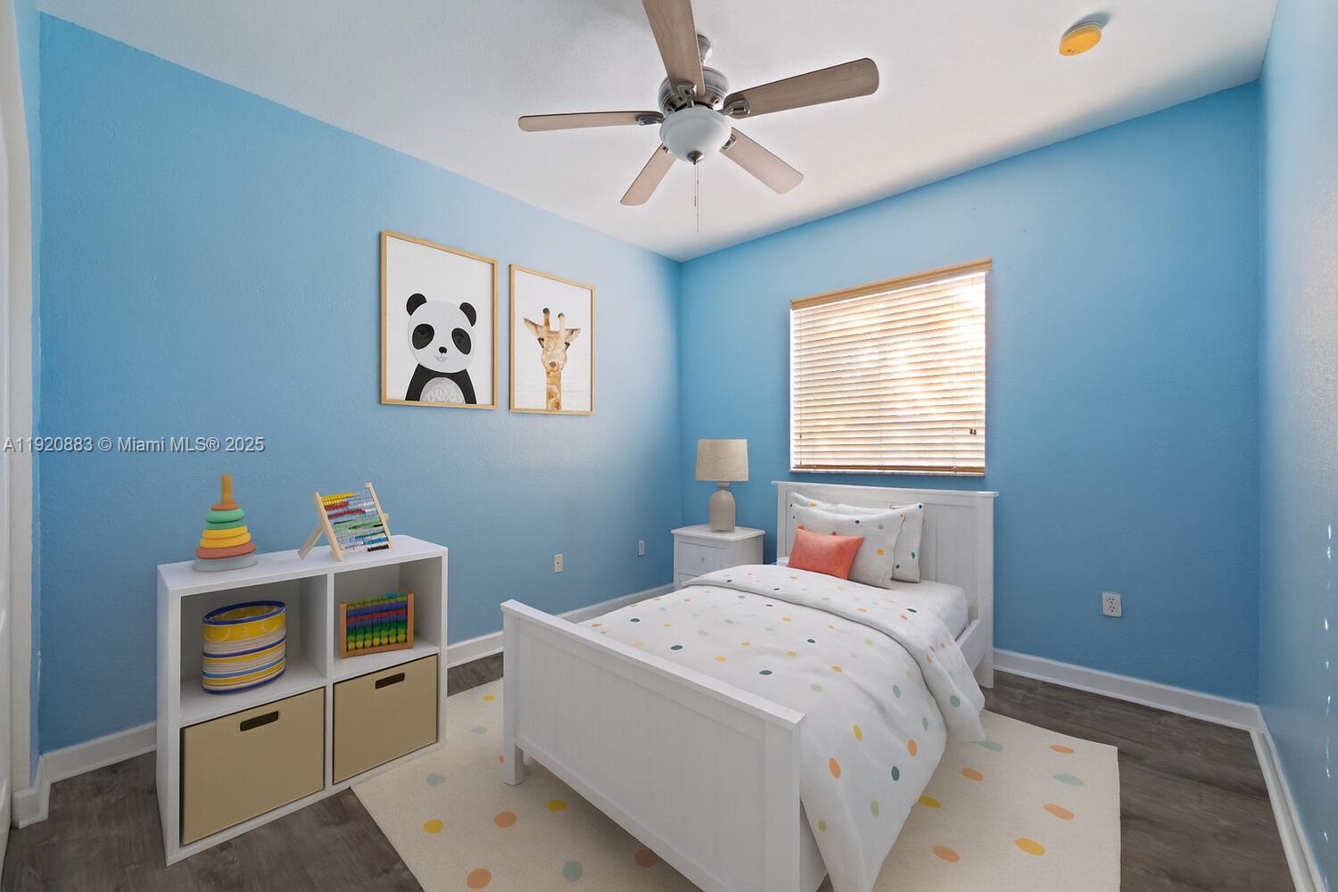 8521 Southwest 214th Terrace Cutler Bay, FL 33189 - Photo 18 of 21 a bed room with a bed and a window