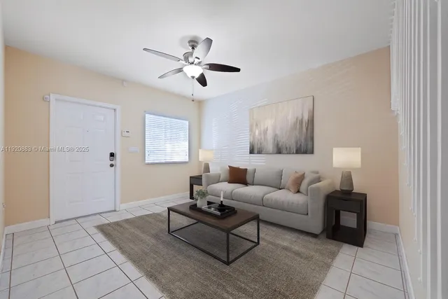 a living room with furniture and a window