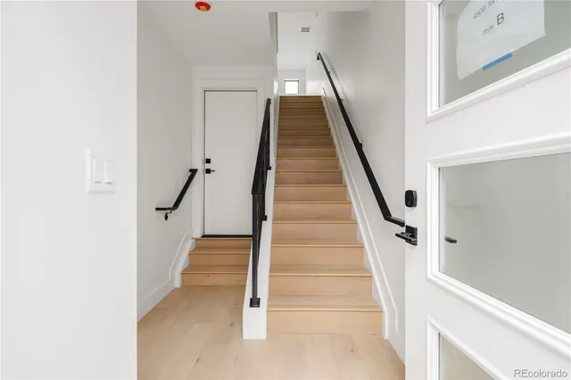 a view of staircase with white walls and white walls
