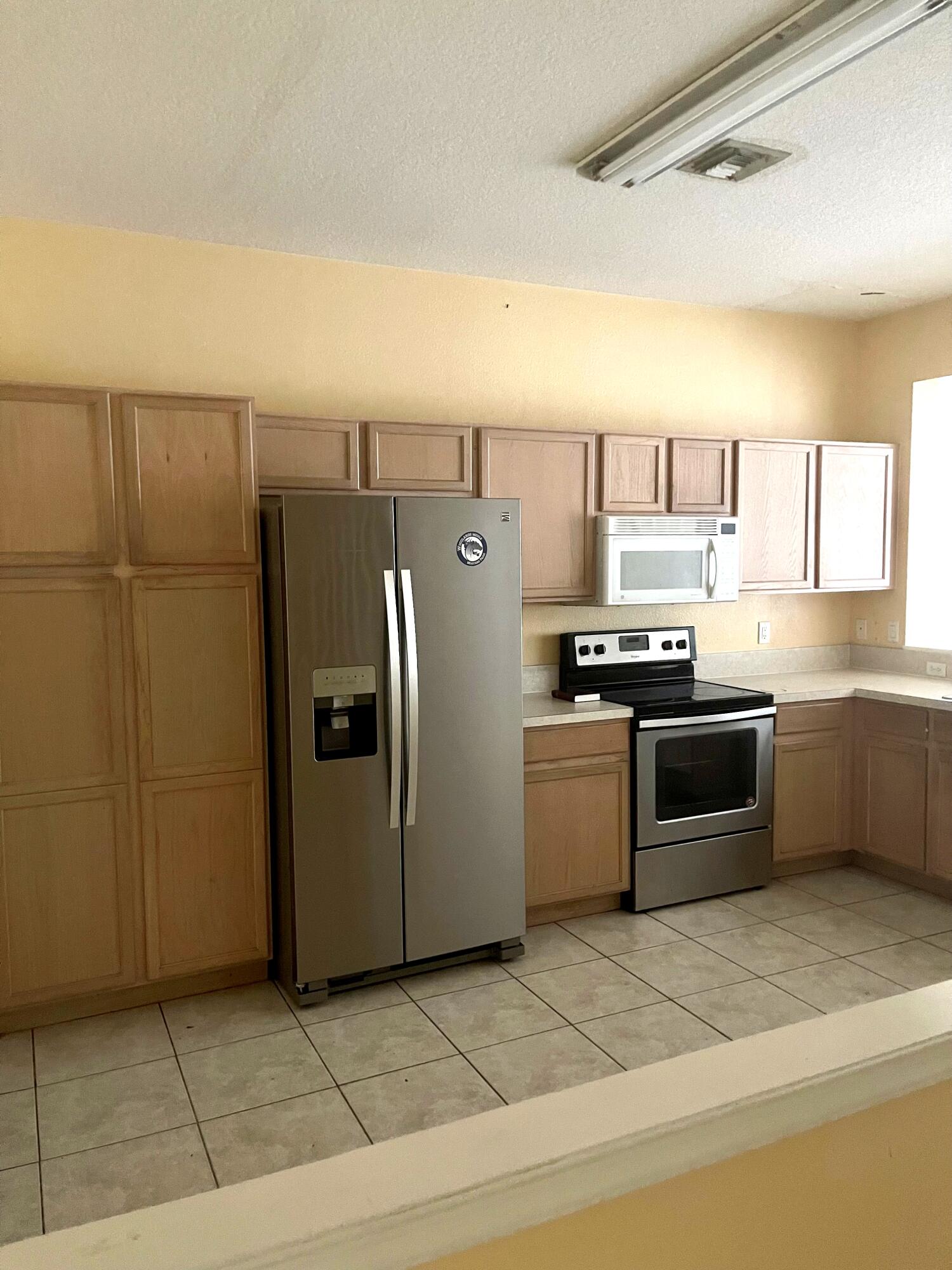1025 Woodfield Road Greenacres, FL 33415 - Photo 5 of 10 IMG_8051