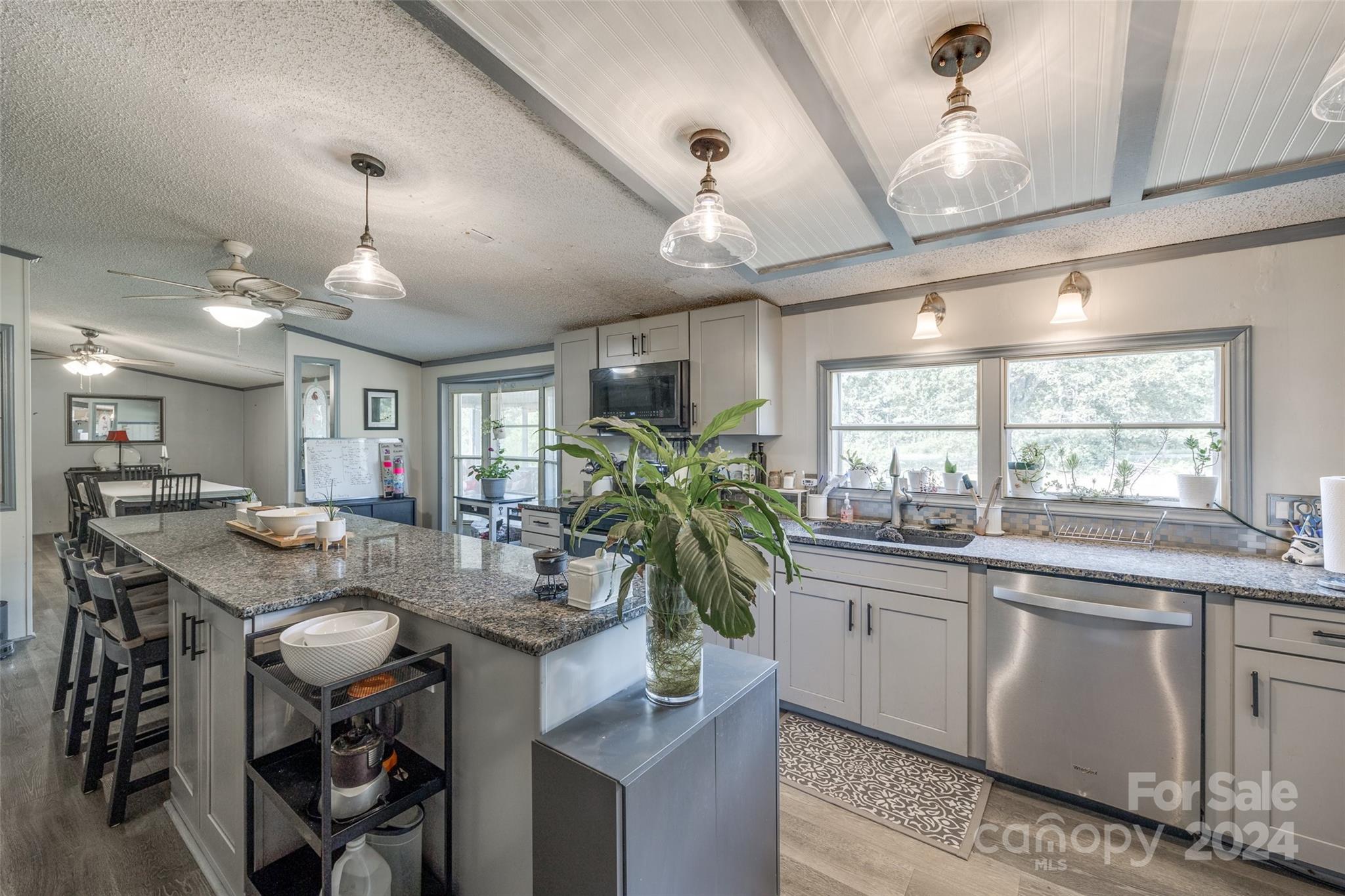 1574 Dunlap Roddey Road Rock Hill, SC 29730 - Photo 13 of 35 a kitchen with sink table and chairs