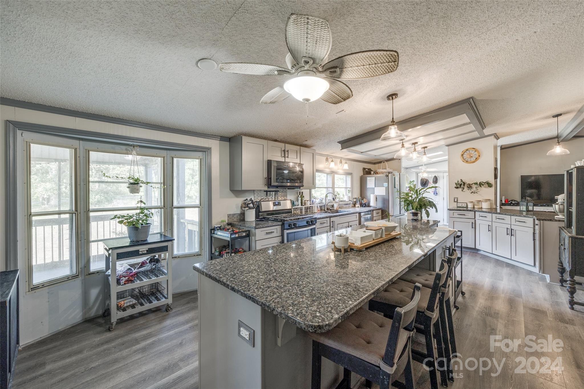 1574 Dunlap Roddey Road Rock Hill, SC 29730 - Photo 14 of 35 a dining room with furniture and wooden floor
