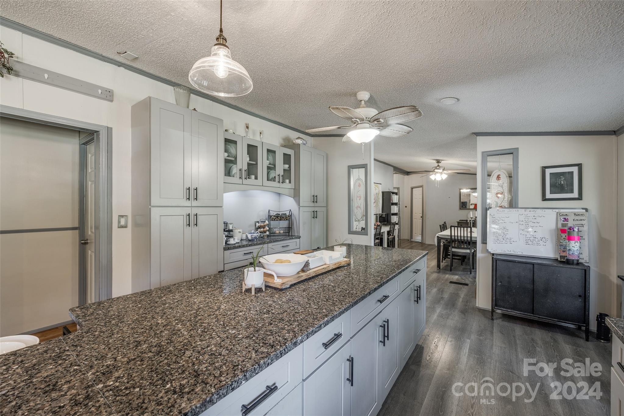 1574 Dunlap Roddey Road Rock Hill, SC 29730 - Photo 15 of 35 a spacious bathroom with a granite countertop sink and a mirror