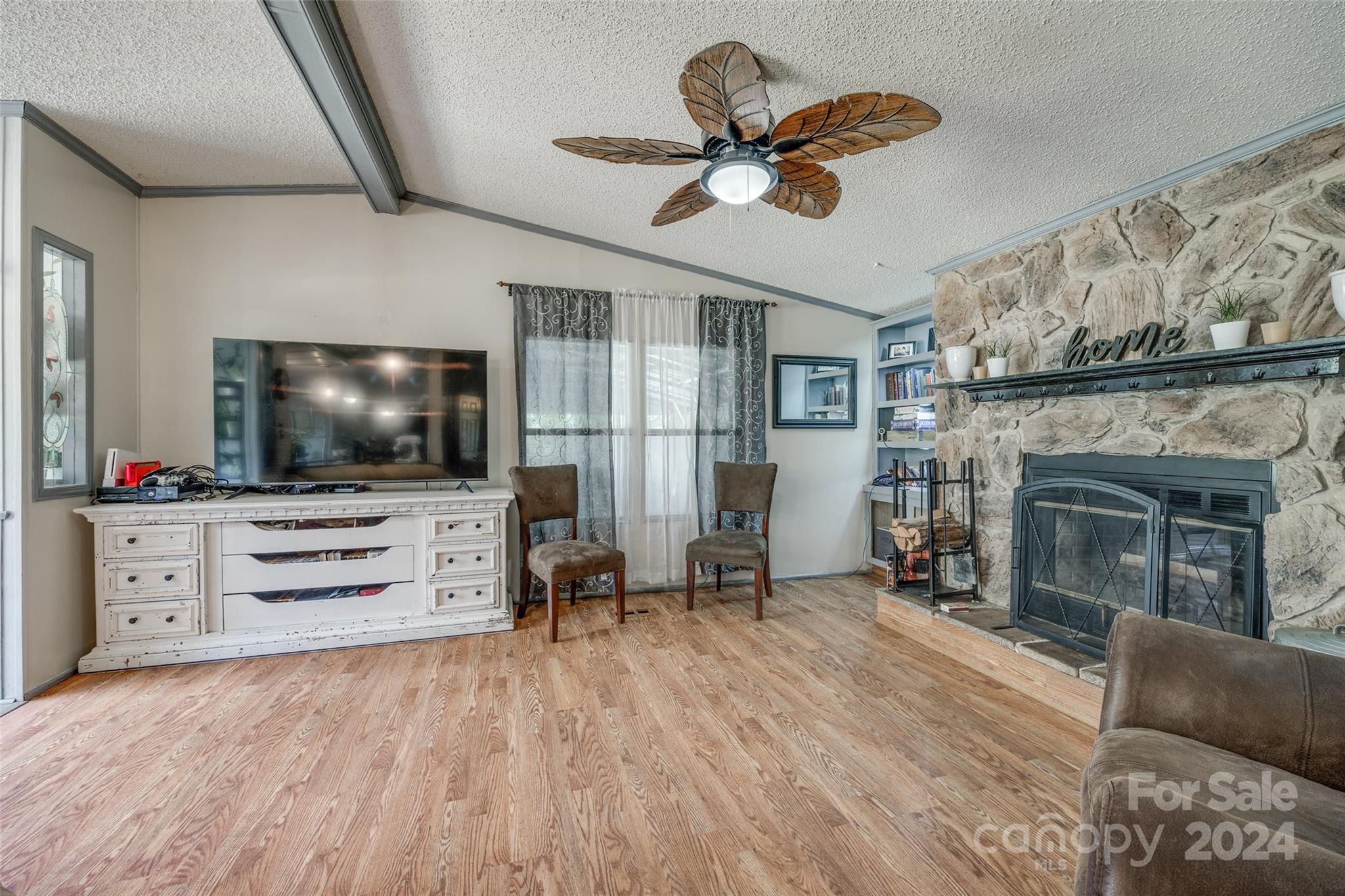 1574 Dunlap Roddey Road Rock Hill, SC 29730 - Photo 18 of 35 a living room with furniture and a flat screen tv