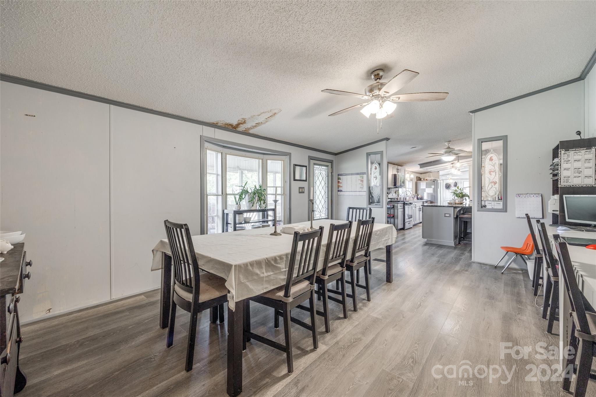 1574 Dunlap Roddey Road Rock Hill, SC 29730 - Photo 21 of 35 a view of a dining room with furniture and wooden floor