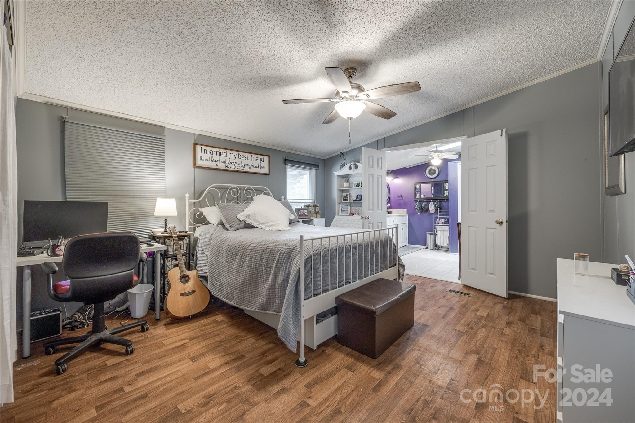 1574 Dunlap Roddey Road Rock Hill, SC 29730 - Photo 22 of 35 a bedroom with a bed and a chair