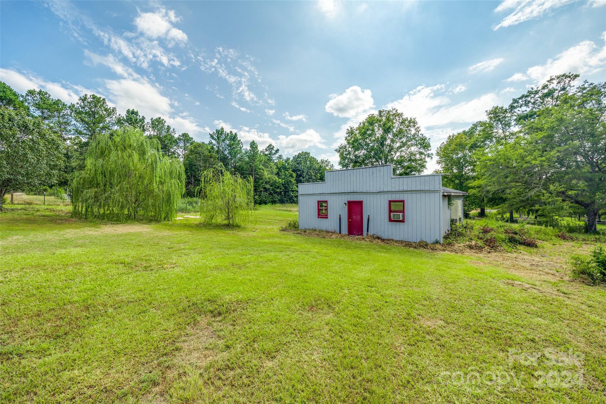 1574 Dunlap Roddey Road Rock Hill, SC 29730 - Photo 4 of 35 a view of a yard with a tree