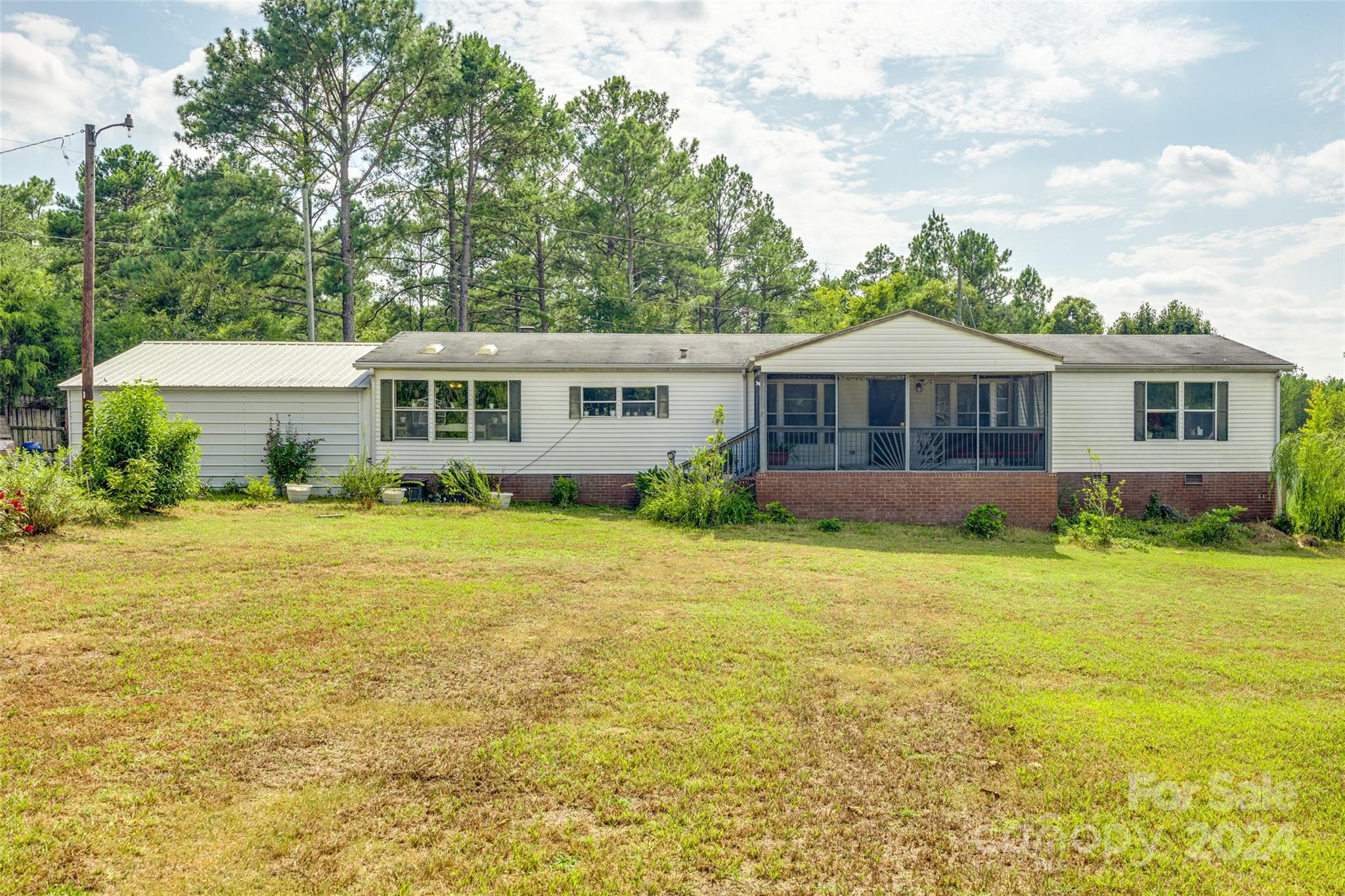 1574 Dunlap Roddey Road Rock Hill, SC 29730 - Photo 6 of 35 a front view of a house with swimming pool