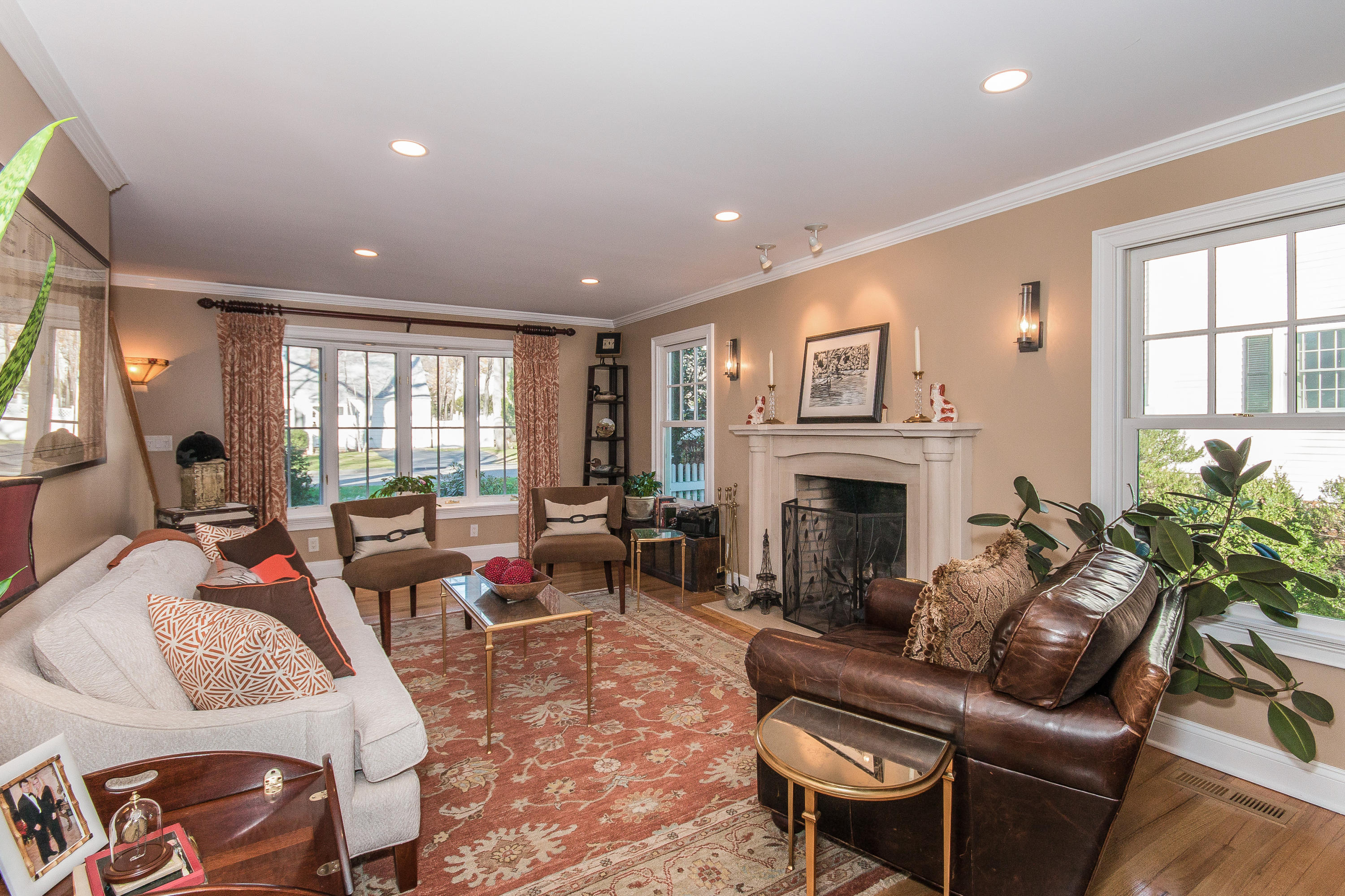 28 Intervale Road Darien, CT 06820 - Photo 4 of 24 a living room with furniture fireplace and a large window