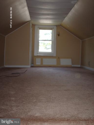 12 Commerce Street Taneytown, MD 21787 - Photo 1 of 21 a view of an empty room with a window