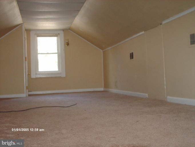 12 Commerce Street Taneytown, MD 21787 - Photo 7 of 21 an empty room with windows