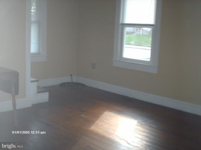 12 Commerce Street Taneytown, MD 21787 - Photo 10 of 21 an empty room with a window