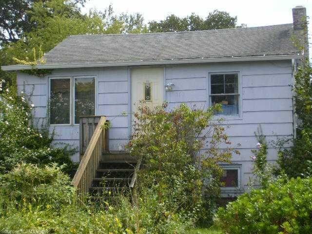 170 Cosey Beach Road East Haven, CT 06512 - Photo 1 of 1 a front view of a house with garden