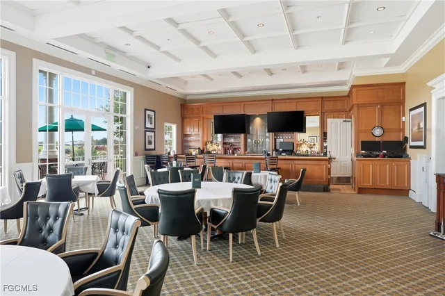 a view of a dining room with furniture window and outside view