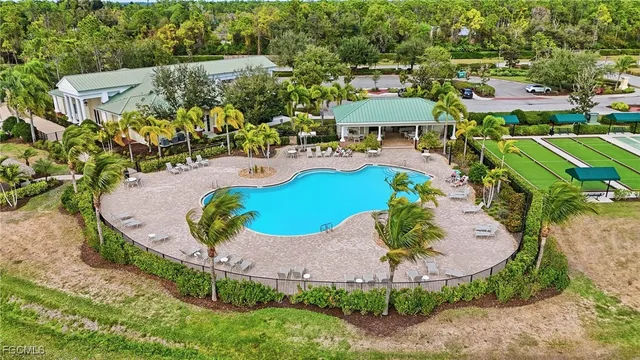 an aerial view of a house with outdoor space