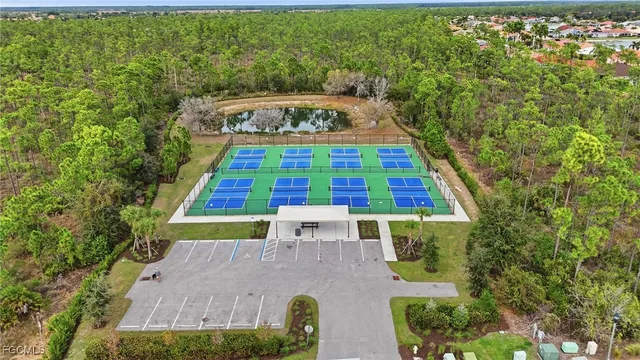 an aerial view of house with yard