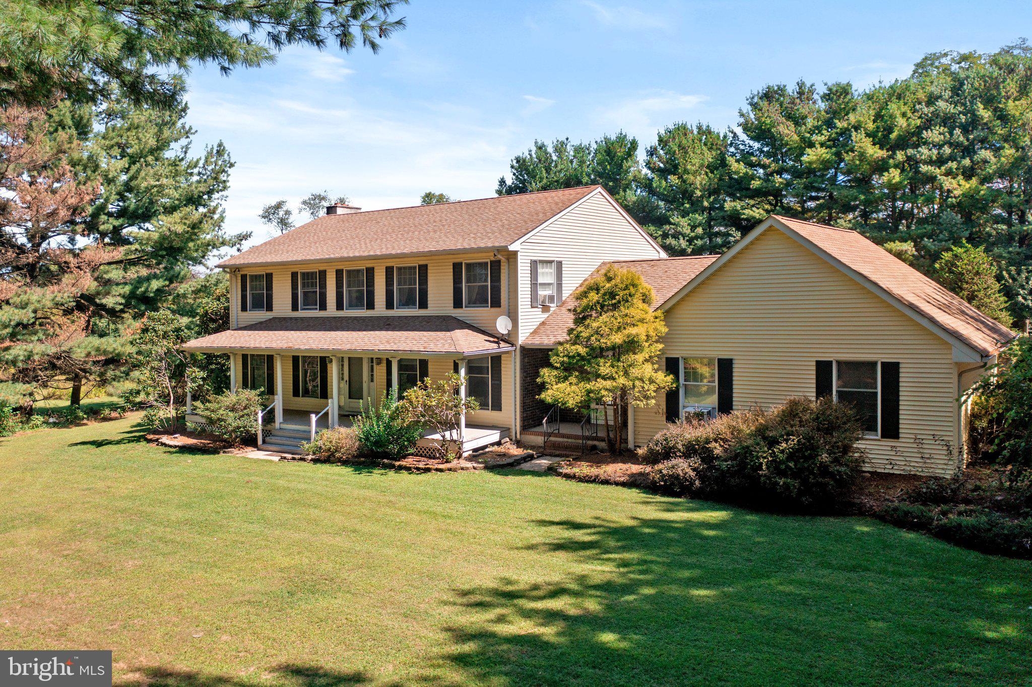 87 Bordentown Chesterfield Road Chesterfield, NJ 08515 - Photo 43 of 49 a front view of a house with garden