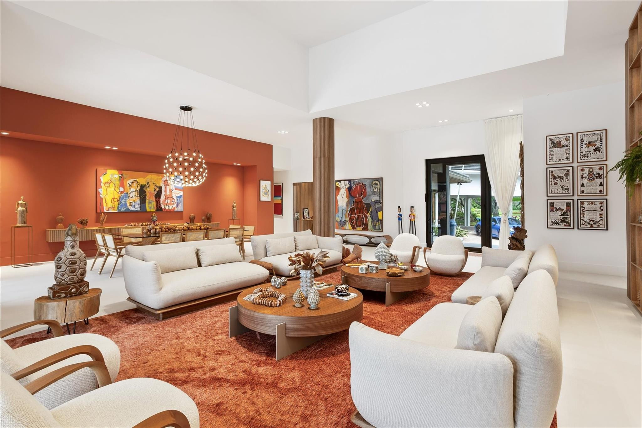 3340 Paddock Road Weston, FL 33331 - Photo 11 of 68 a living room with furniture kitchen view and large windows