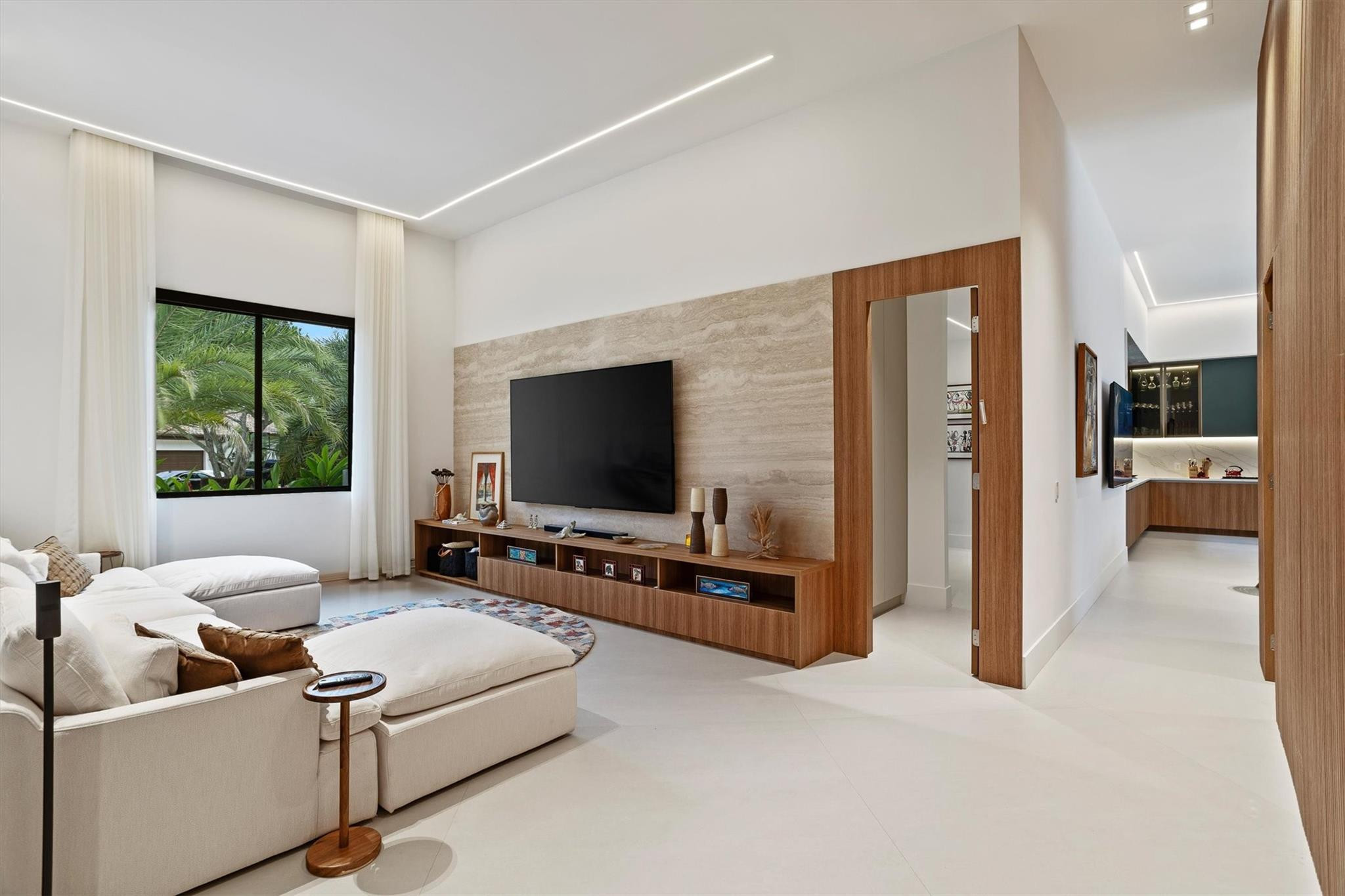 3340 Paddock Road Weston, FL 33331 - Photo 18 of 68 a living room with furniture and a flat screen tv