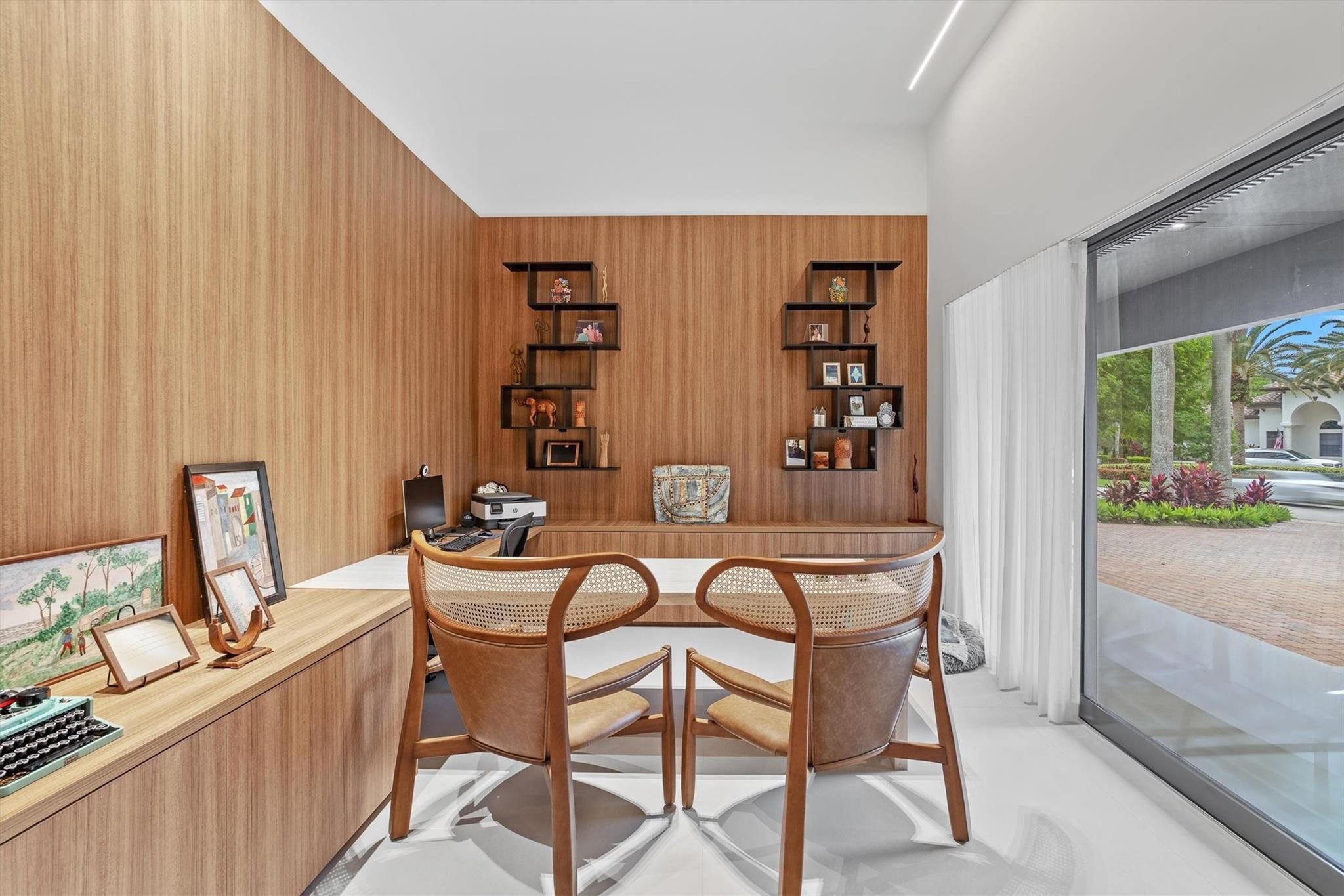 3340 Paddock Road Weston, FL 33331 - Photo 19 of 68 a view of a dining room with furniture and chandelier