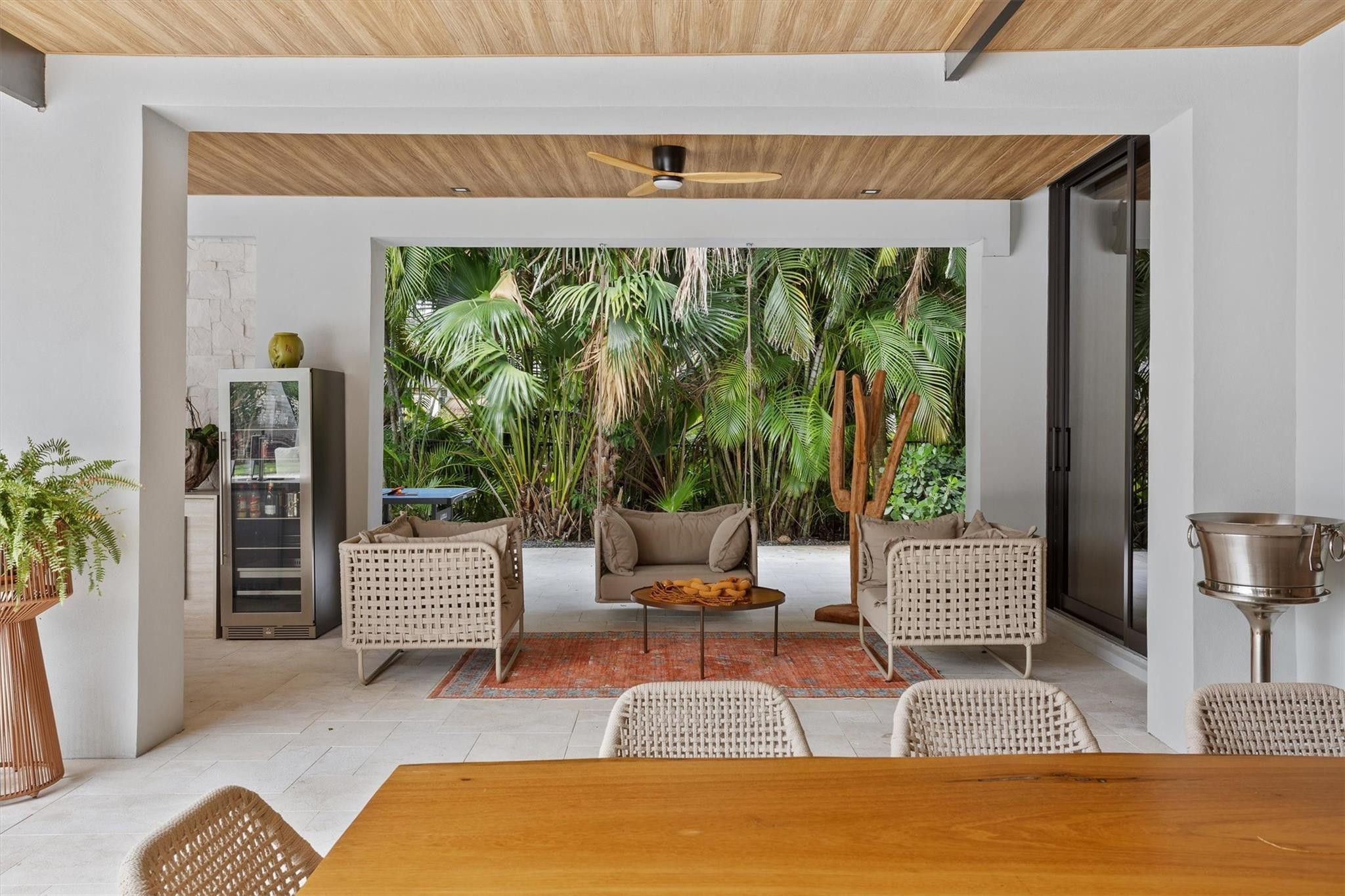 3340 Paddock Road Weston, FL 33331 - Photo 26 of 68 a living room with furniture and a large window