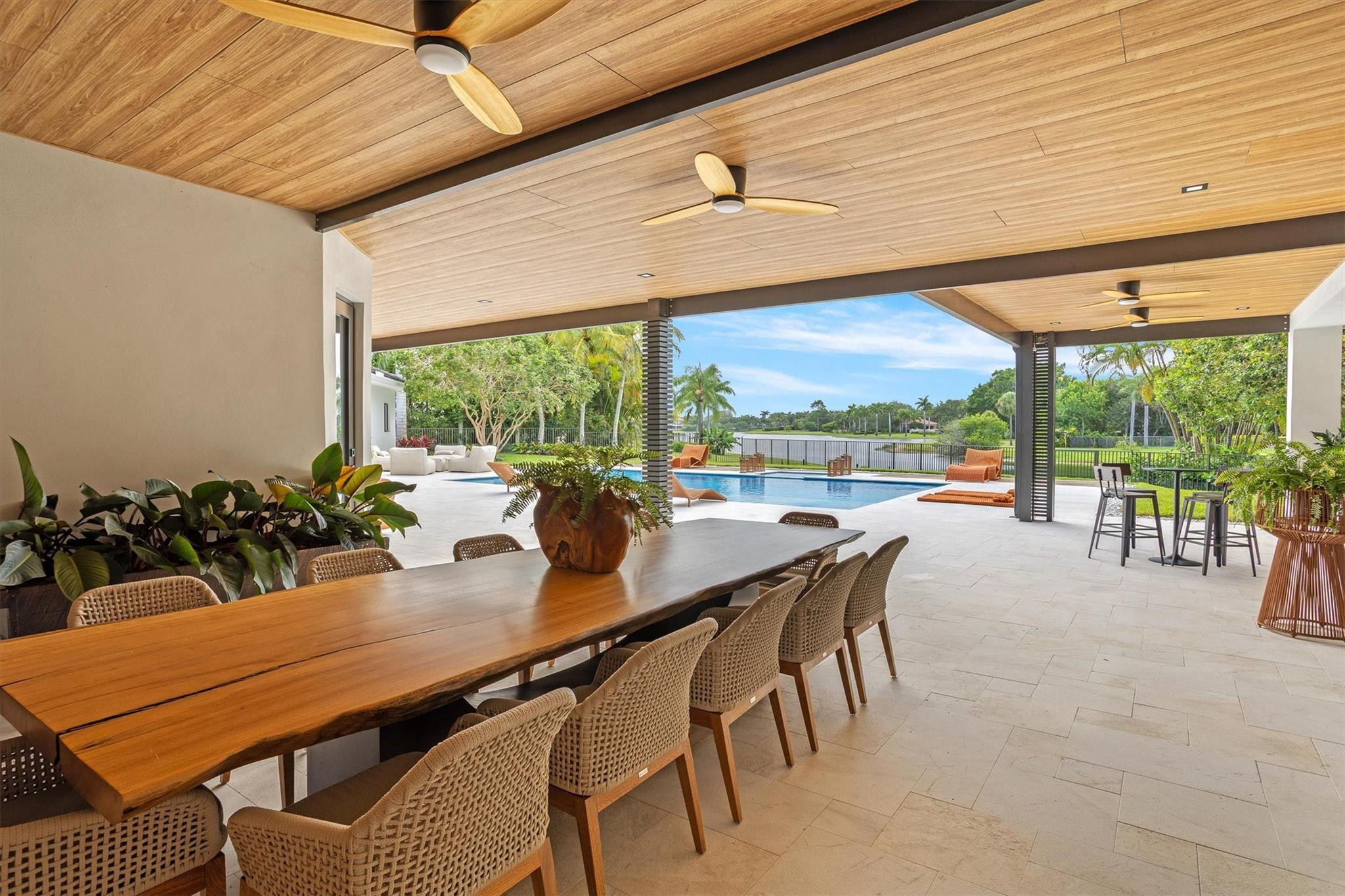 3340 Paddock Road Weston, FL 33331 - Photo 27 of 68 a dining room with furniture window and outside view