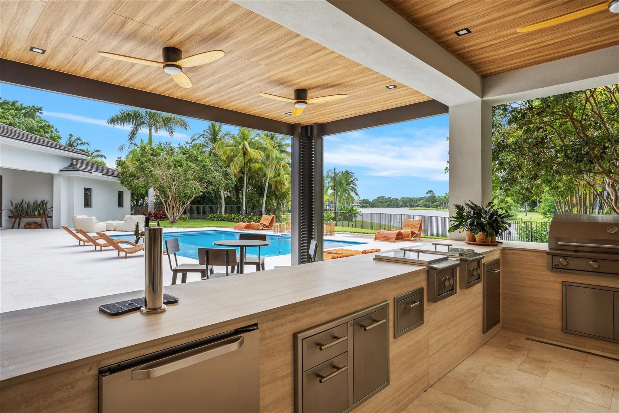 3340 Paddock Road Weston, FL 33331 - Photo 36 of 68 a kitchen with a sink and a refrigerator