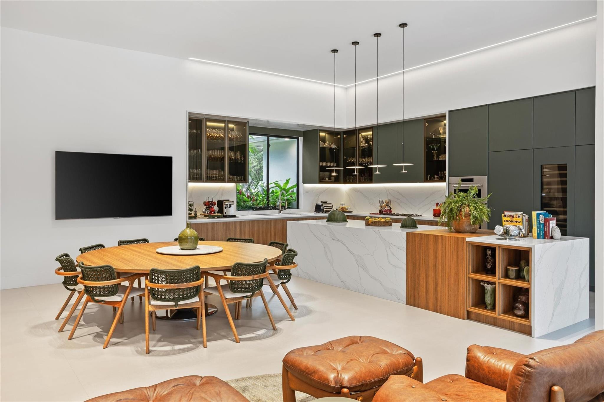 3340 Paddock Road Weston, FL 33331 - Photo 4 of 68 a view of kitchen with stainless steel appliances granite countertop dining table and chairs