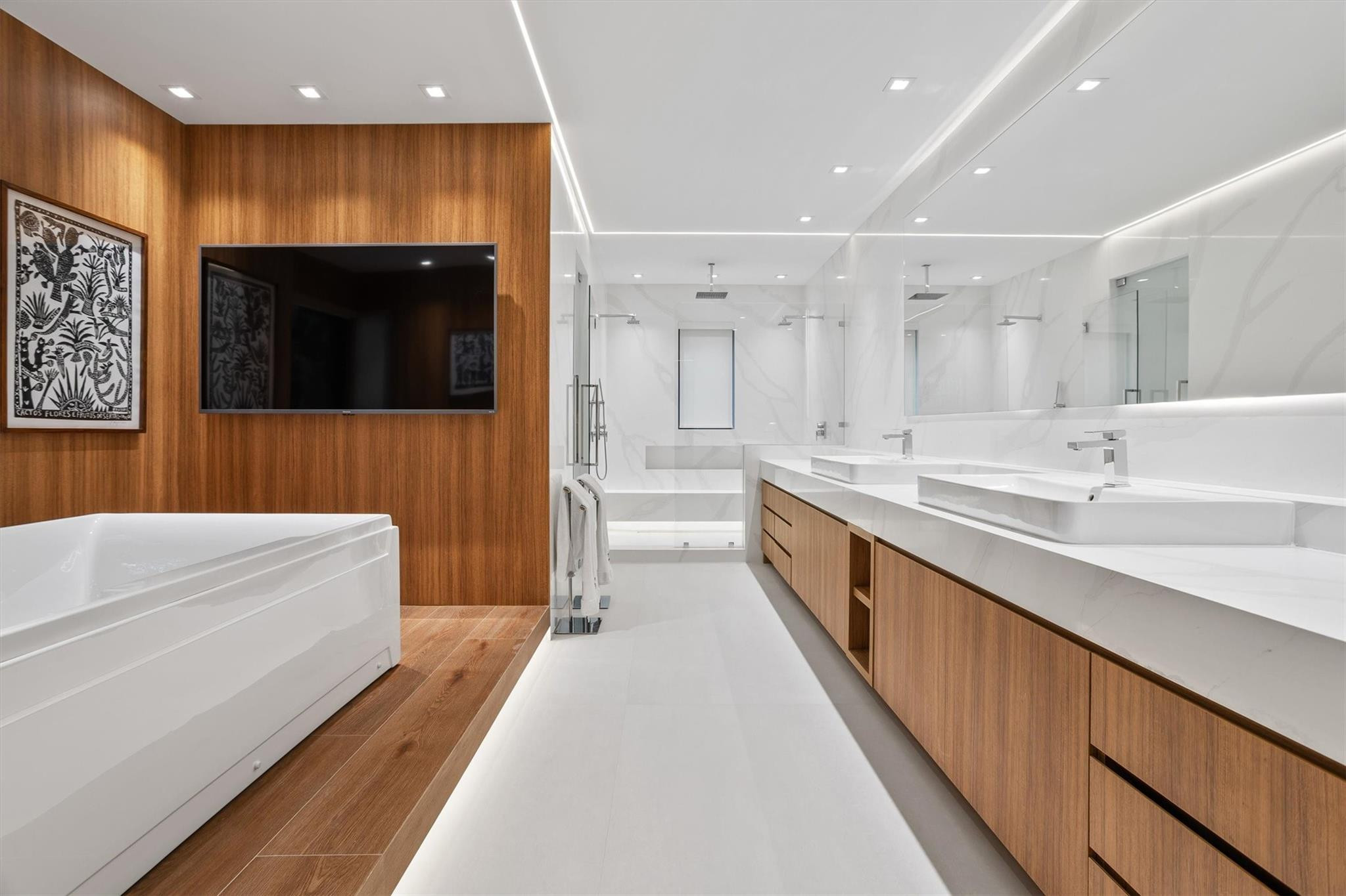 3340 Paddock Road Weston, FL 33331 - Photo 43 of 68 a large white kitchen with a large window and stainless steel appliances