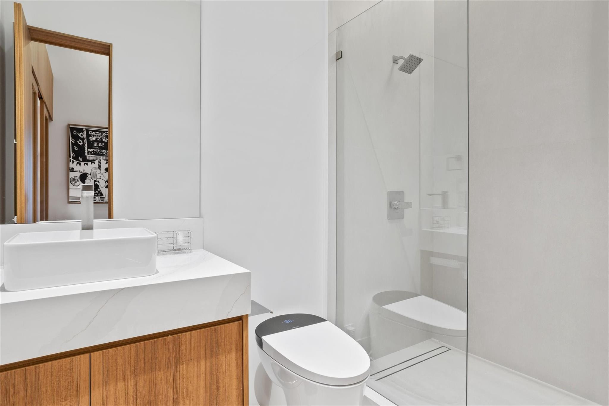 3340 Paddock Road Weston, FL 33331 - Photo 53 of 68 a bathroom with a sink a toilet and shower