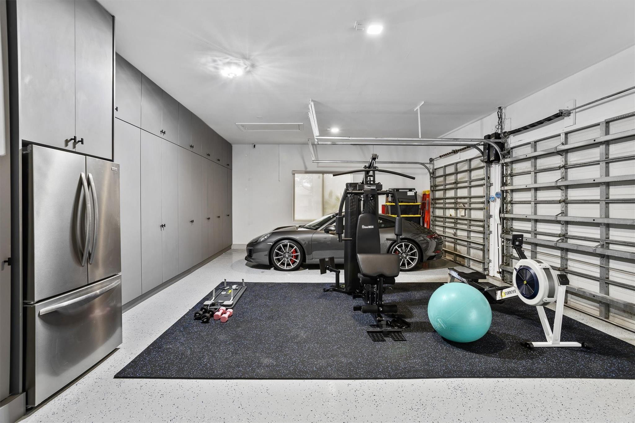 3340 Paddock Road Weston, FL 33331 - Photo 61 of 68 a room with gym equipment