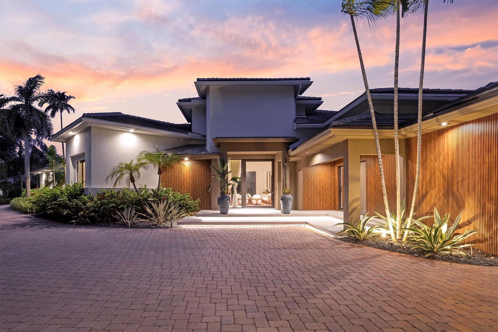 3340 Paddock Road Weston, FL 33331 - Photo 63 of 68 a front view of a house having yard