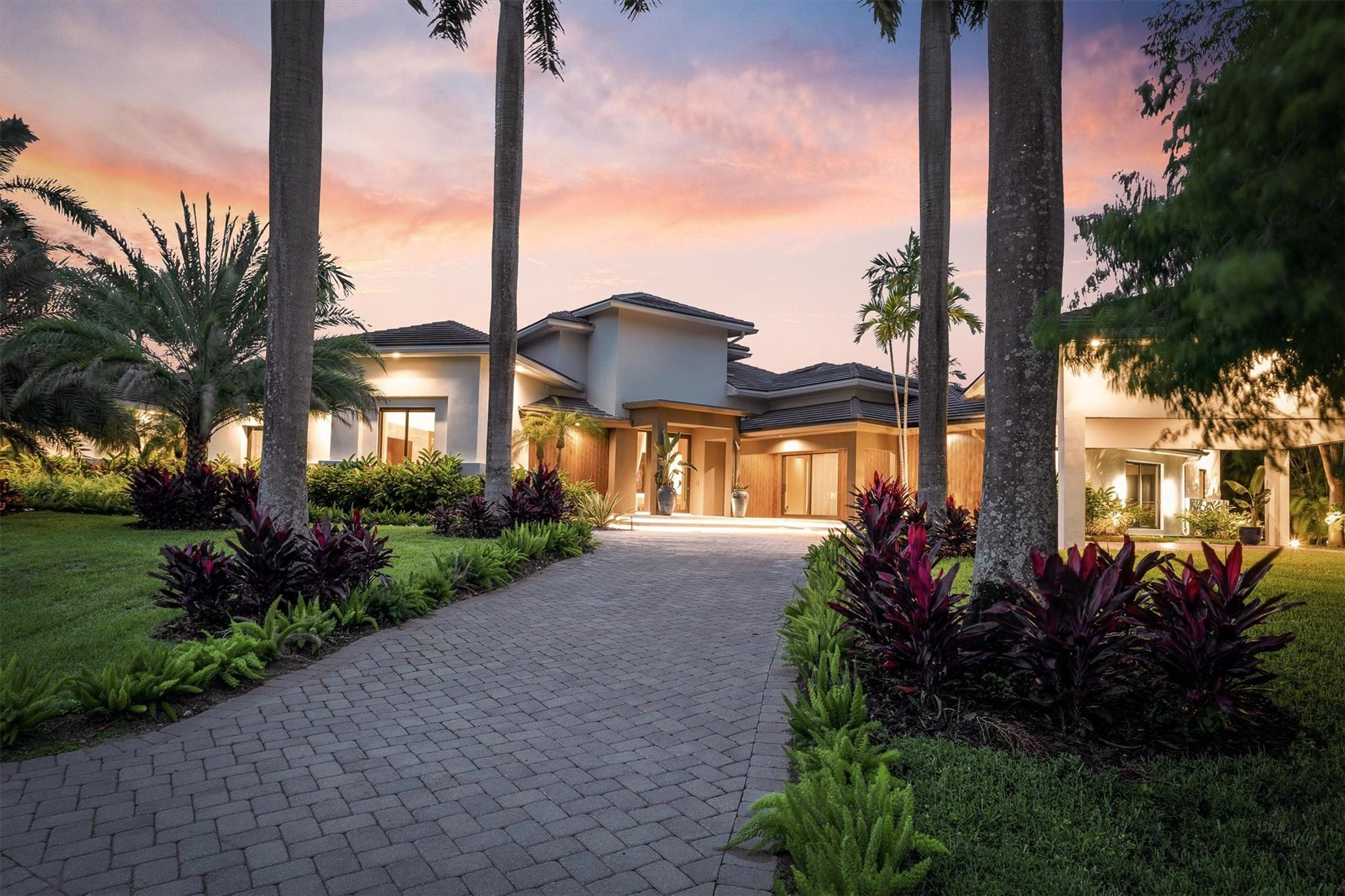 3340 Paddock Road Weston, FL 33331 - Photo 67 of 68 a view of a house with a yard and potted plants