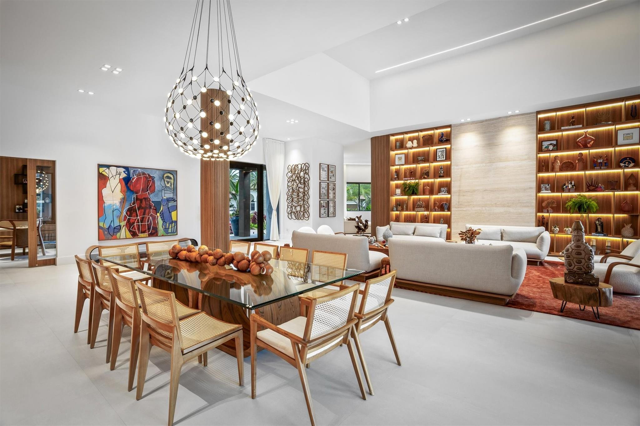 3340 Paddock Road Weston, FL 33331 - Photo 9 of 68 a dining room with furniture a chandelier and window