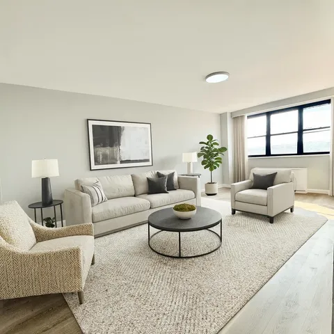 a living room with furniture and a couch