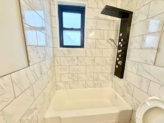 a bathroom with a bathtub