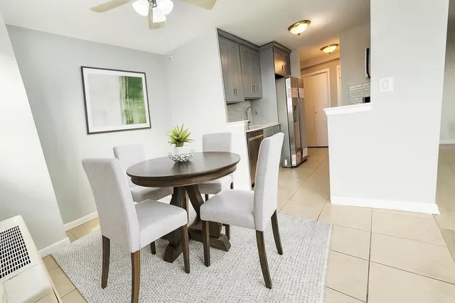 a view of a dining room with furniture