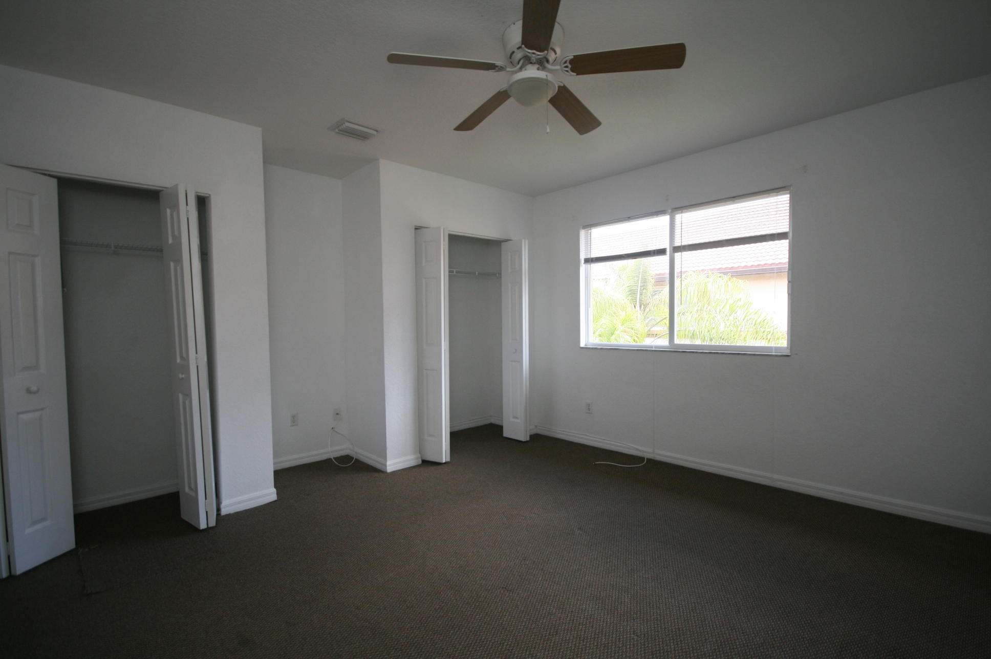 1918 Hibiscus Lane Riviera Beach, FL 33404 - Photo 3 of 14 Master bedroom closets