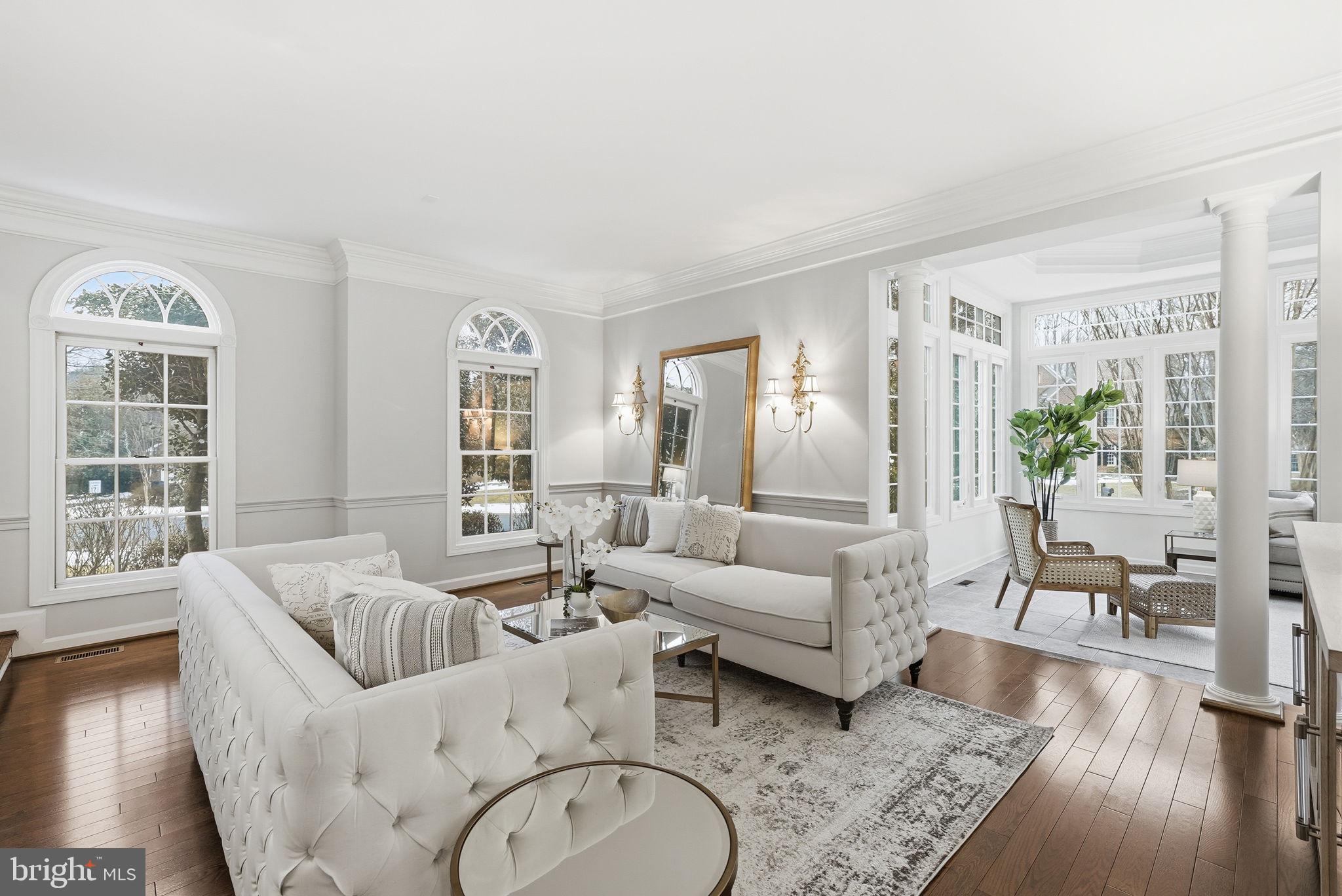 11588 Cedar Chase Road Herndon, VA 20170 - Photo 12 of 81 a living room with furniture and a large window