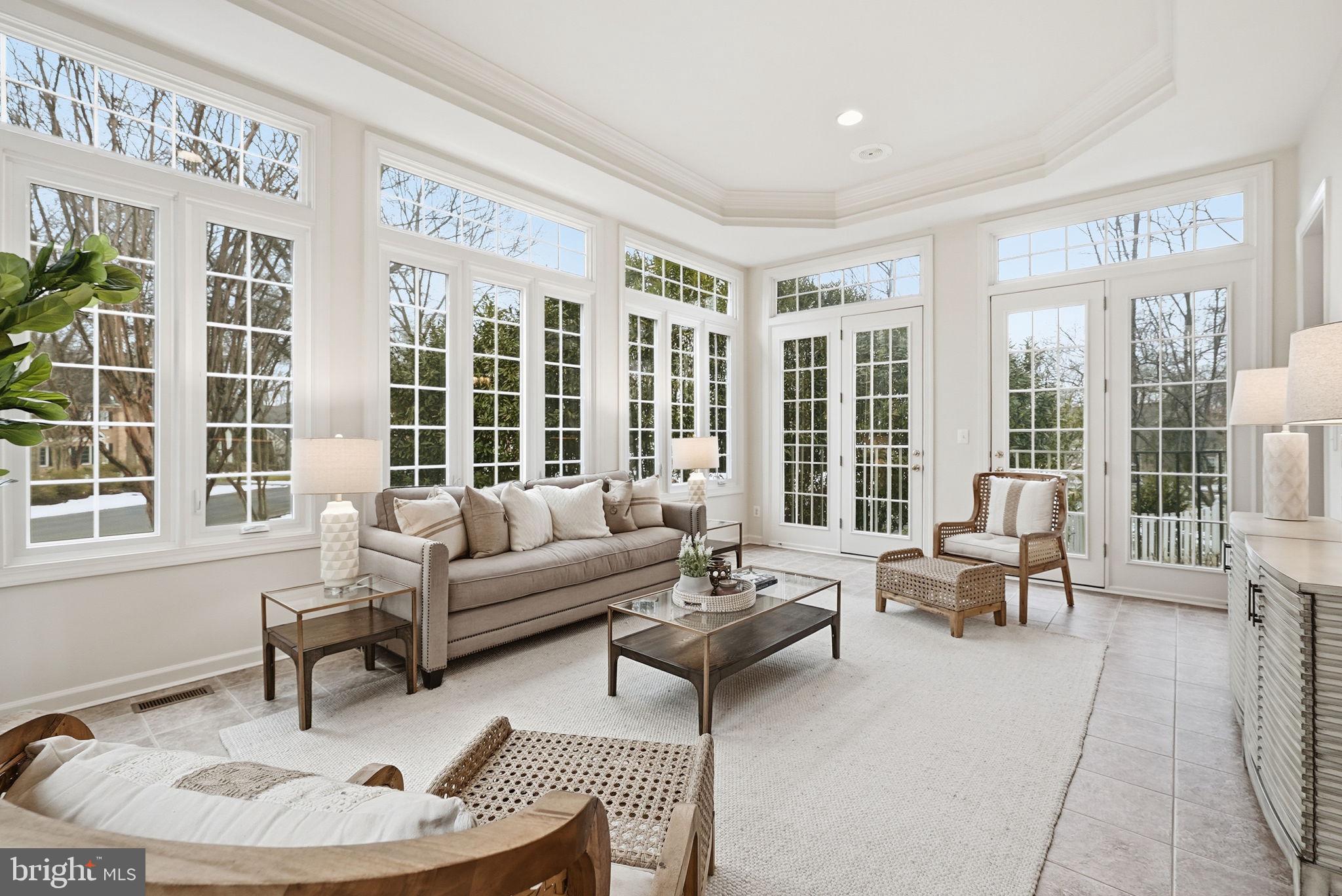 11588 Cedar Chase Road Herndon, VA 20170 - Photo 13 of 81 a living room with furniture and a large window