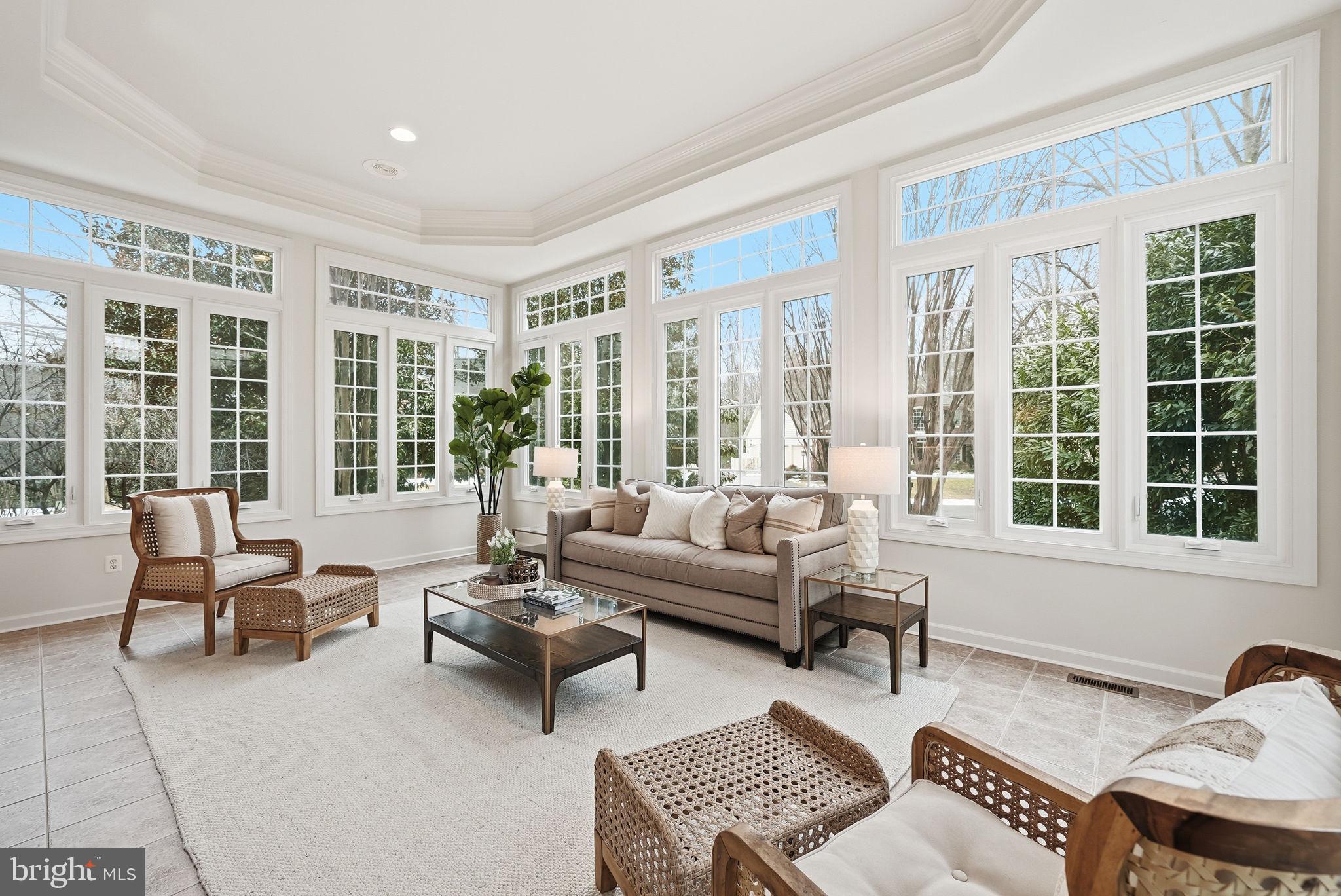 11588 Cedar Chase Road Herndon, VA 20170 - Photo 14 of 81 a living room with furniture and floor to ceiling windows
