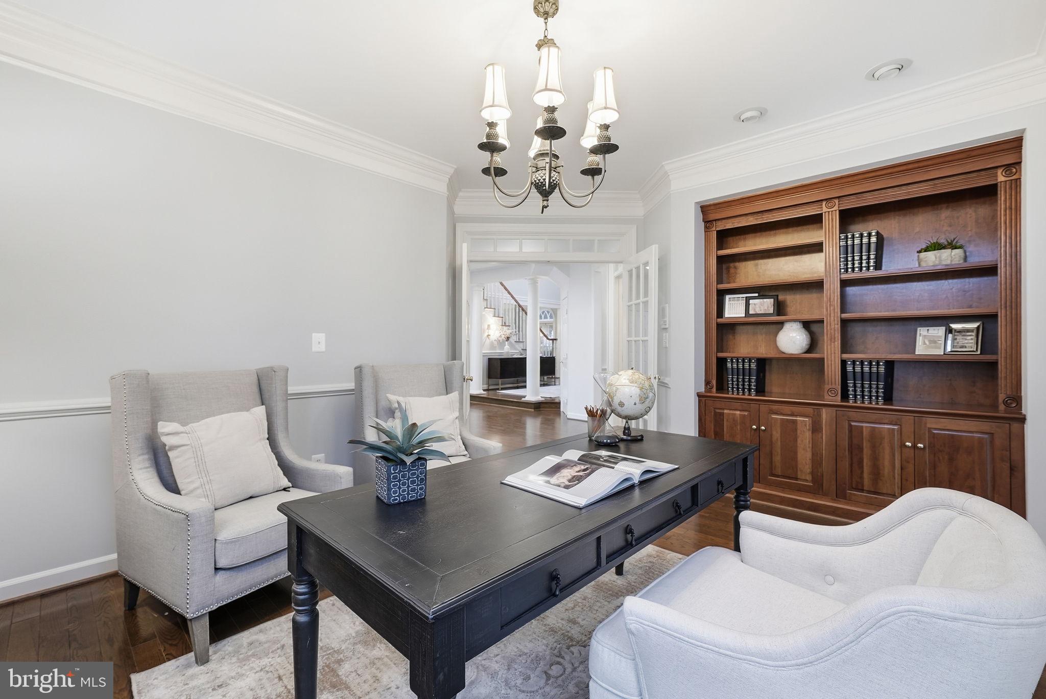 11588 Cedar Chase Road Herndon, VA 20170 - Photo 18 of 81 a view of a dining room with furniture and chandelier