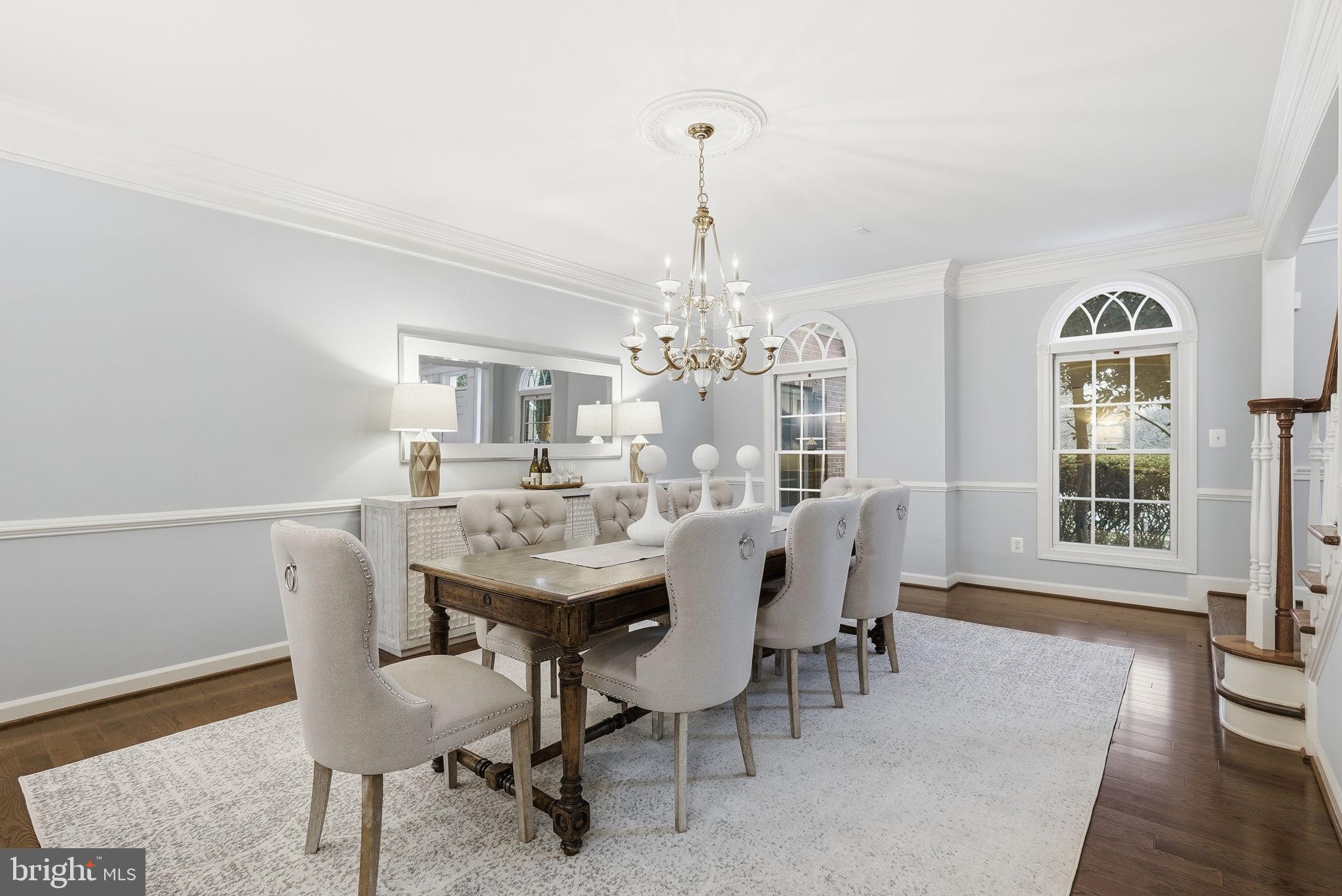 11588 Cedar Chase Road Herndon, VA 20170 - Photo 21 of 81 a view of a dining room with furniture window and wooden floor