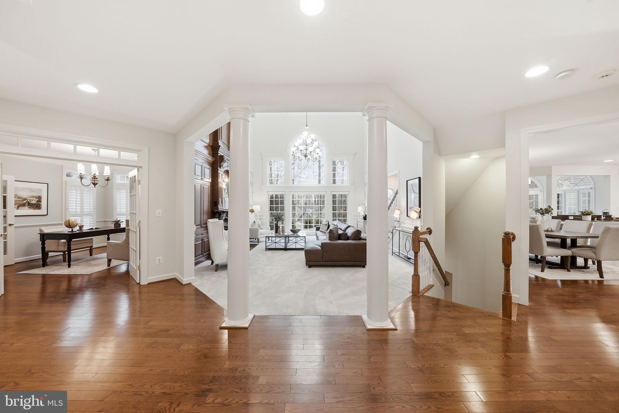 11588 Cedar Chase Road Herndon, VA 20170 - Photo 25 of 81 a living room with furniture and a wooden floor