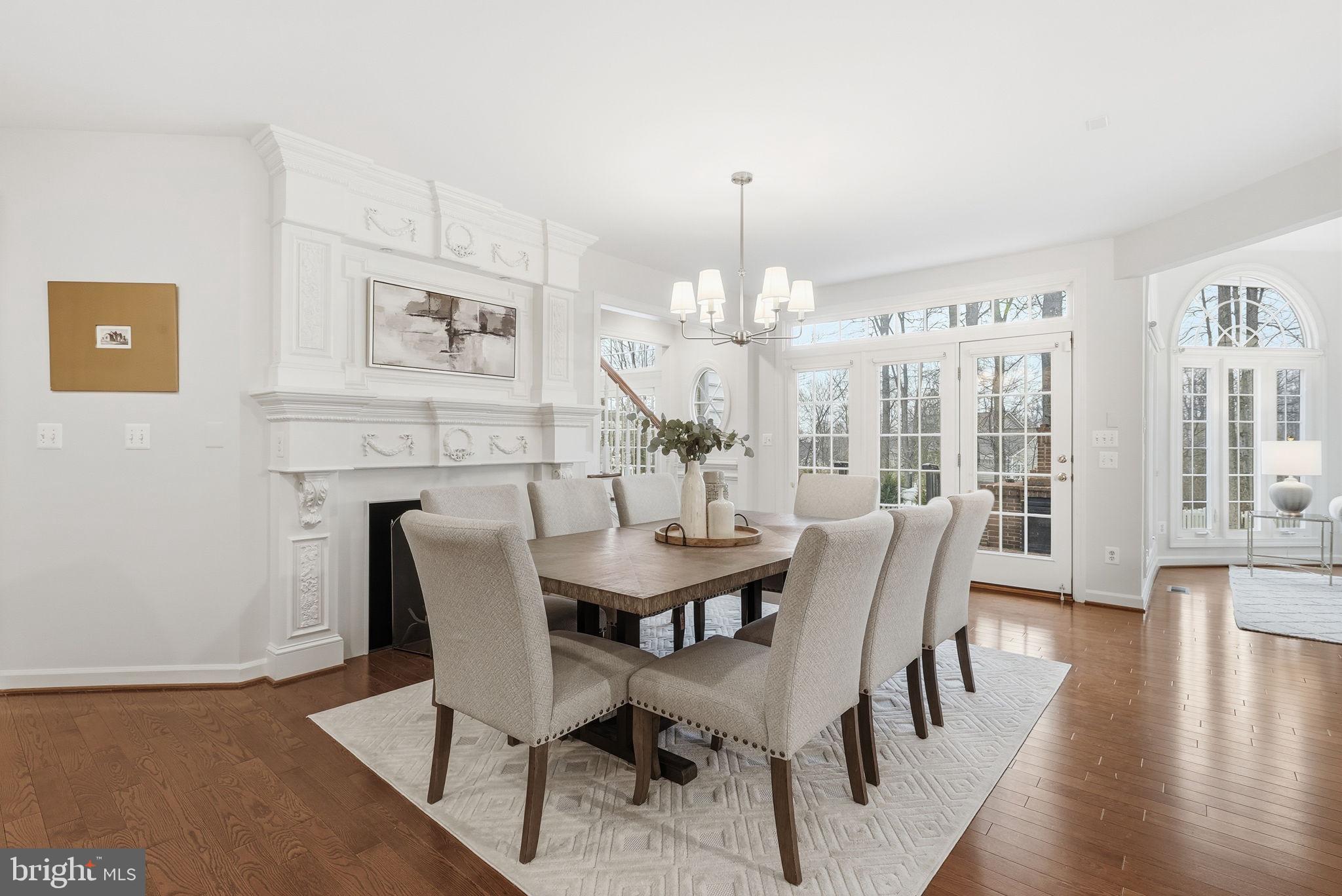 11588 Cedar Chase Road Herndon, VA 20170 - Photo 35 of 81 a view of a dining room with furniture window and wooden floor