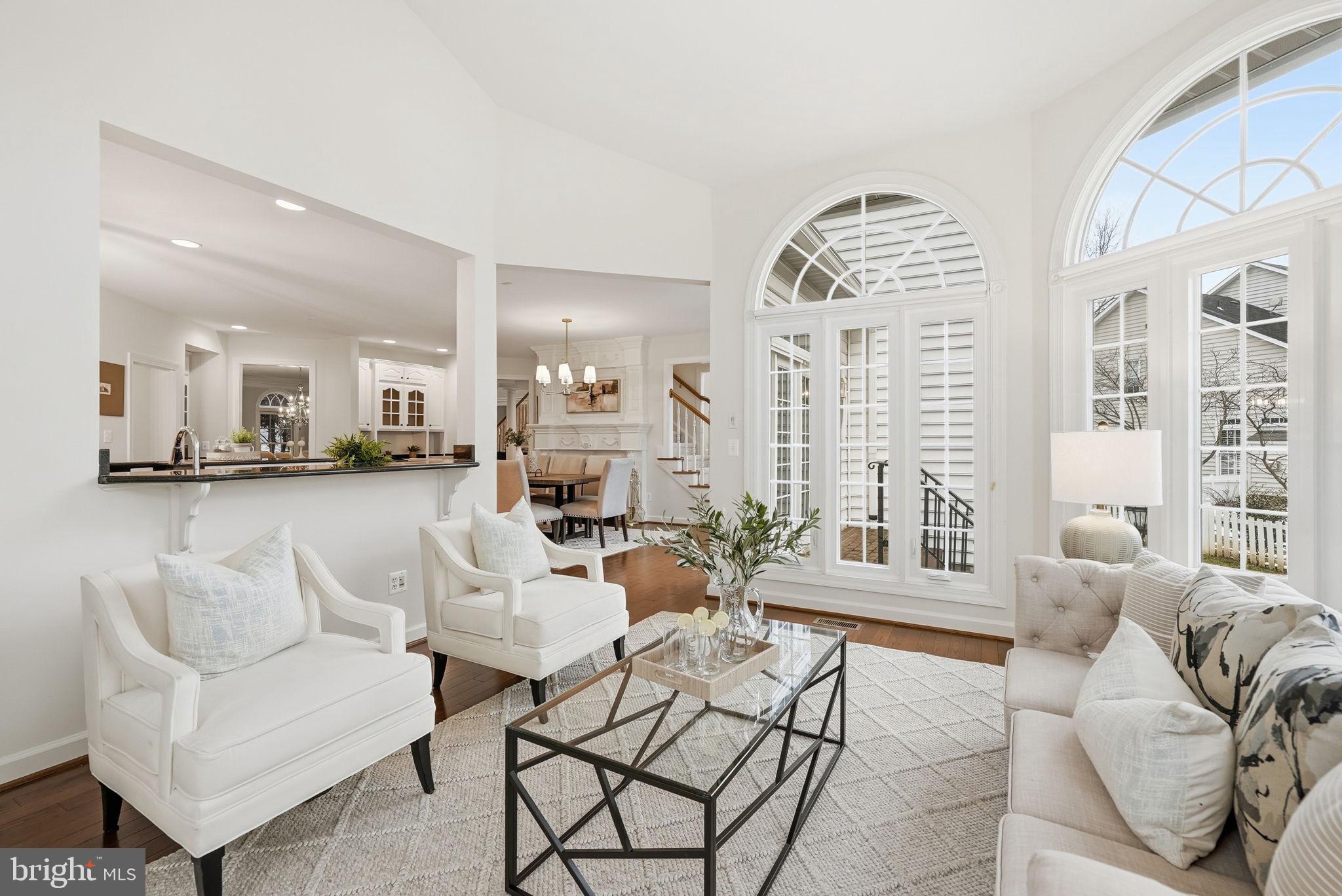 11588 Cedar Chase Road Herndon, VA 20170 - Photo 43 of 81 a living room with furniture and a large window