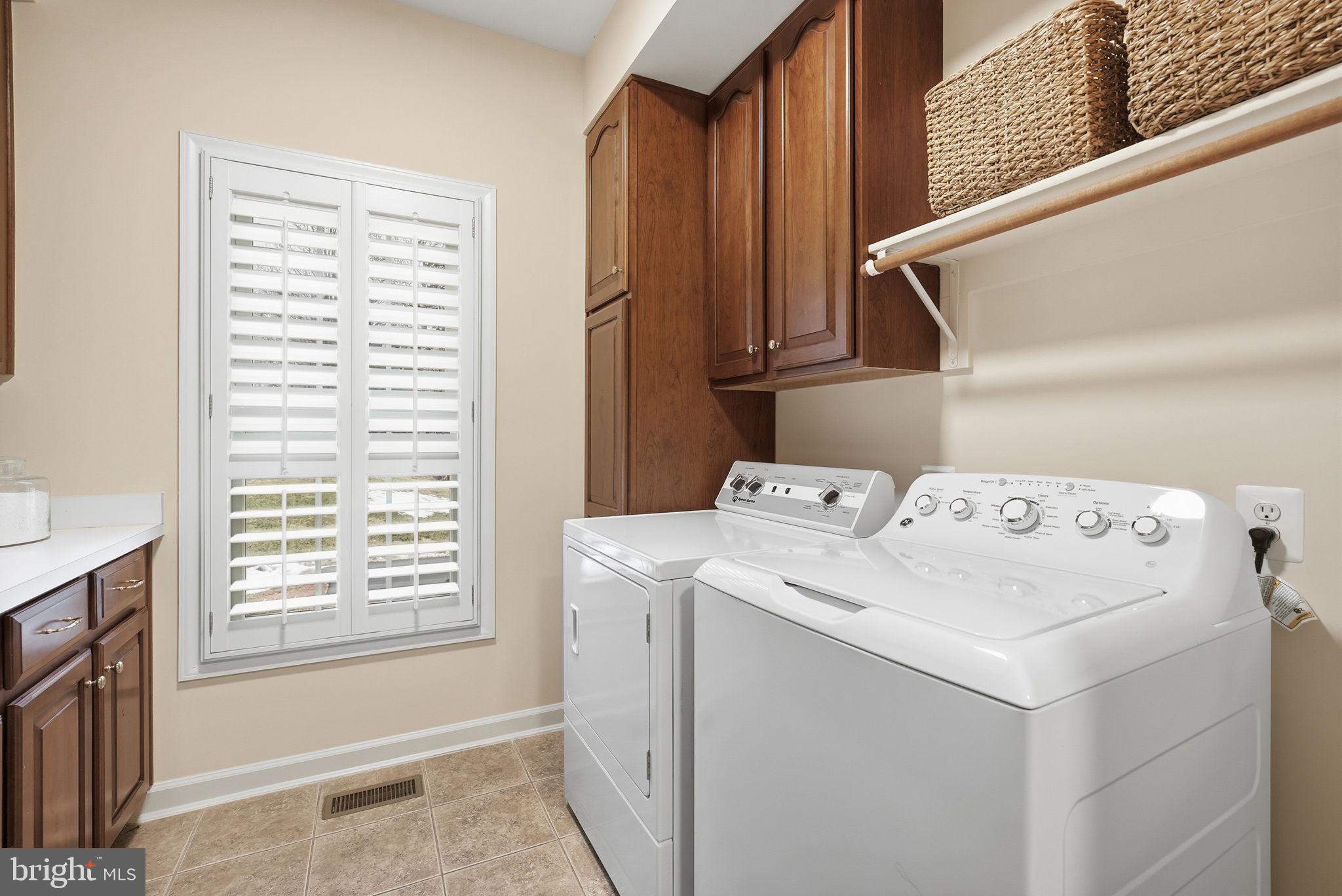 11588 Cedar Chase Road Herndon, VA 20170 - Photo 45 of 81 a utility room with dryer and washer