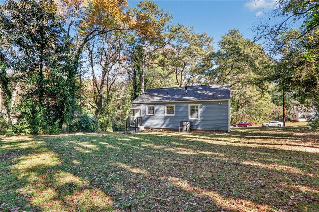 2019 Grant Road Southwest Atlanta, GA 30331 - Photo 17 of 17 a view of a house with a yard